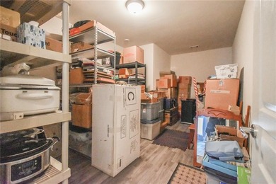 Welcome to this beautifully maintained four-bedroom, three-bath