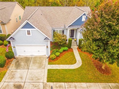 Welcome to this beautifully maintained four-bedroom, three-bath