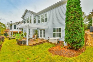 Welcome to this beautifully maintained four-bedroom, three-bath