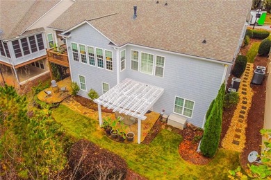 Welcome to this beautifully maintained four-bedroom, three-bath