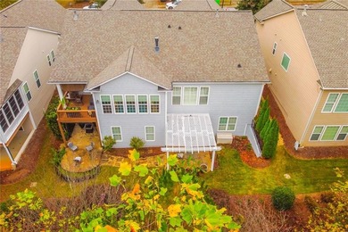 Welcome to this beautifully maintained four-bedroom, three-bath