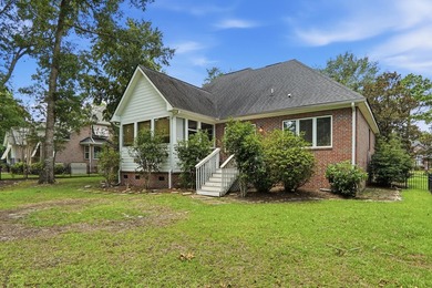 Set among mature trees on a quiet street, this brick traditional - photo 50