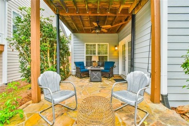 Welcome to this beautifully maintained four-bedroom, three-bath