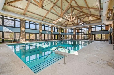 Welcome to this beautifully maintained four-bedroom, three-bath