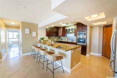 Step into luxury with this beautifully remodeled condo in the - photo 3