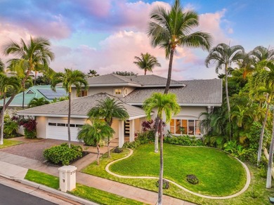 Located in the desirable gated community of Wailea Kialoa, this - photo 1