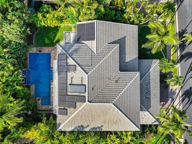 Located in the desirable gated community of Wailea Kialoa, this - photo 4