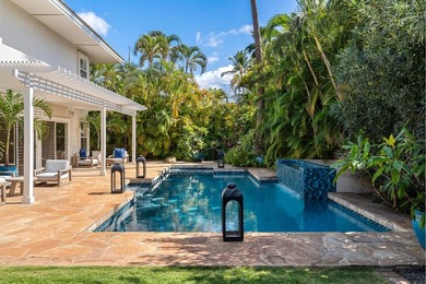 Located in the desirable gated community of Wailea Kialoa, this - photo 5