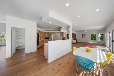 Located in the desirable gated community of Wailea Kialoa, this - photo 7