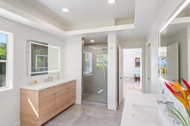 Located in the desirable gated community of Wailea Kialoa, this - photo 9