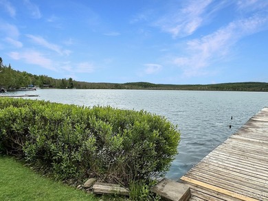 Experience true Northwoods living with this charming waterfront - photo 3