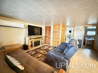Experience true Northwoods living with this charming waterfront - photo 9
