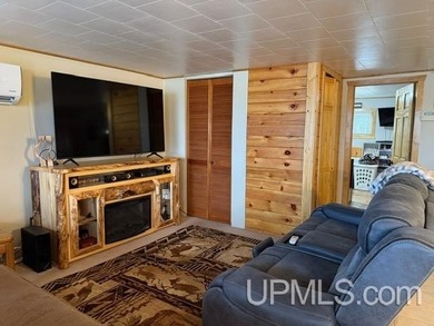 Experience true Northwoods living with this charming waterfront - photo 10