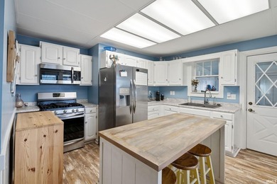 Enjoy lake living with this well-maintained 3-bedroom - photo 8