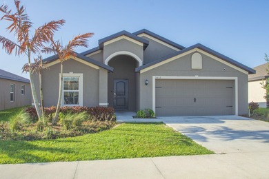 Welcome to Celebration Pointe! Built in 2022, this 4-bedroom - photo 1