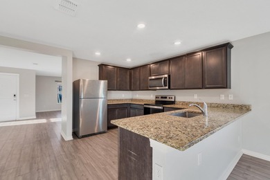 Welcome to Celebration Pointe! Built in 2022, this 4-bedroom - photo 7