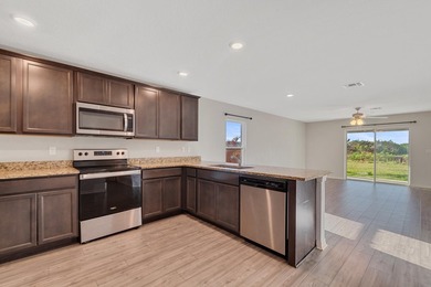 Welcome to Celebration Pointe! Built in 2022, this 4-bedroom - photo 8