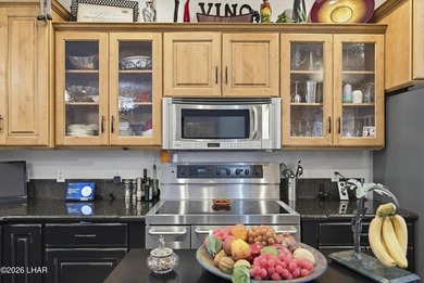 Nestled on over 0.66 acres on a prime corner lot in the - photo 18