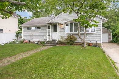 This is a ONE OF A KIND Home - Set on one of Merrick's deepest - photo 1
