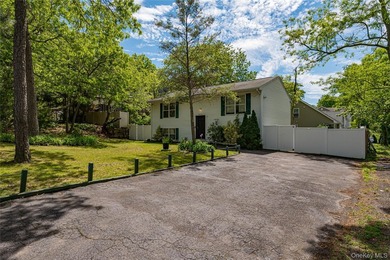 This Hi-Ranch style home offers 2 bedrooms and 1 full bathroom - photo 1