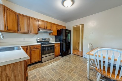 This Hi-Ranch style home offers 2 bedrooms and 1 full bathroom - photo 3