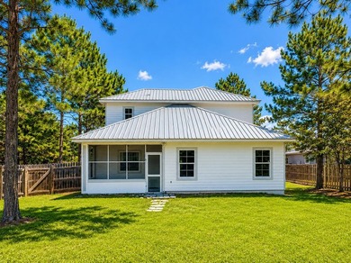 Live the coastal lifestyle in this remarkable 3 bedroom 3.5 - photo 2