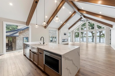 Welcome to an extraordinary lakeside retreat on the coveted - photo 13
