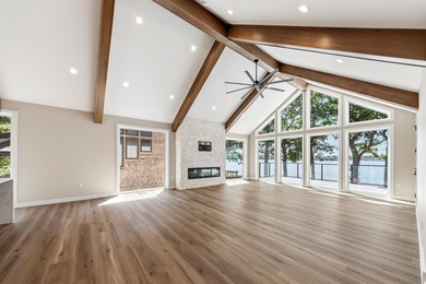 Welcome to an extraordinary lakeside retreat on the coveted - photo 15