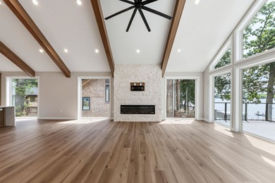 Welcome to an extraordinary lakeside retreat on the coveted - photo 16