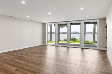 Welcome to an extraordinary lakeside retreat on the coveted - photo 24