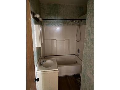 Opportunity knocks! This home is just around the corner from the