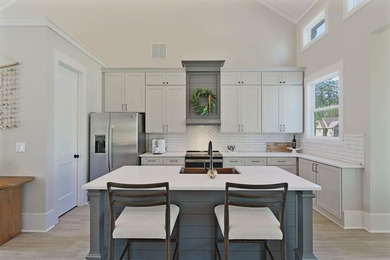 Lake living without compromise. This exceptional 2023-built home - photo 18