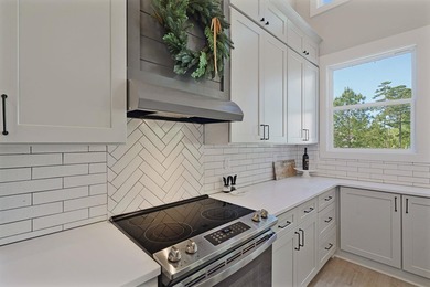 Lake living without compromise. This exceptional 2023-built home - photo 20