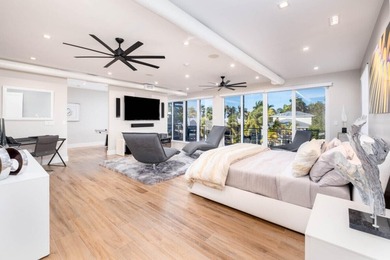 Modern elegance defines this exceptional custom-built waterfront - photo 32