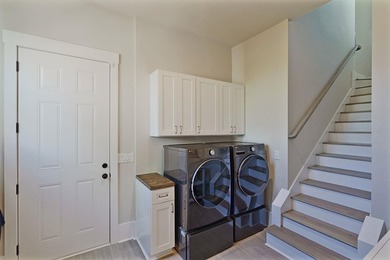 Lake living without compromise. This exceptional 2023-built home - photo 33