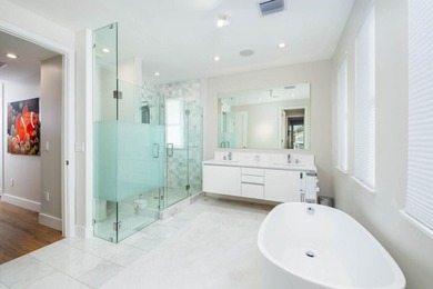 Modern elegance defines this exceptional custom-built waterfront - photo 36