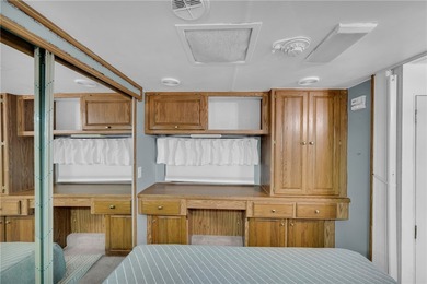 A beautifully maintained 1999 Presidential Glen RV is available - photo 14