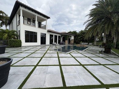 Welcome to a masterpiece of modern elegance set on a coveted - photo 16