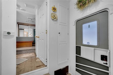 A beautifully maintained 1999 Presidential Glen RV is available - photo 17