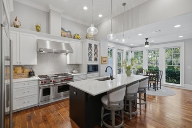Experience refined coastal living within the prestigious, gated - photo 8