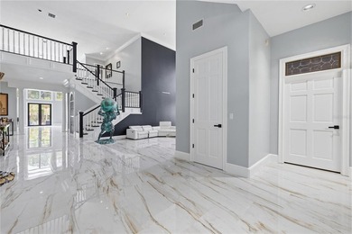 This 7-bedroom, 10-bathroom mini mansion is located in an - photo 2