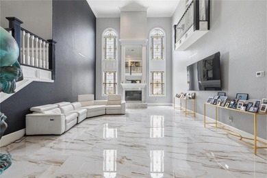 This 7-bedroom, 10-bathroom mini mansion is located in an - photo 4