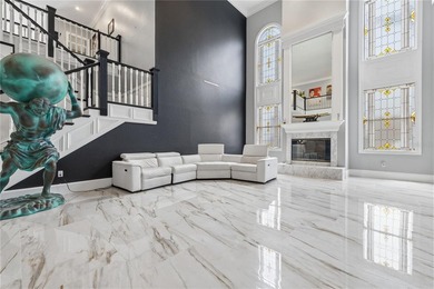 This 7-bedroom, 10-bathroom mini mansion is located in an - photo 5