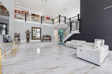This 7-bedroom, 10-bathroom mini mansion is located in an - photo 6