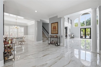 This 7-bedroom, 10-bathroom mini mansion is located in an - photo 7