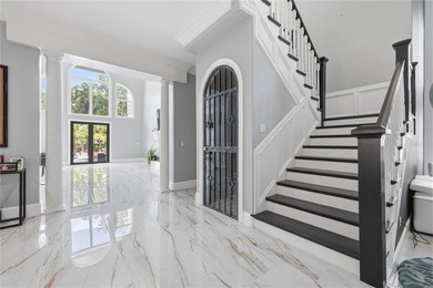 This 7-bedroom, 10-bathroom mini mansion is located in an - photo 8