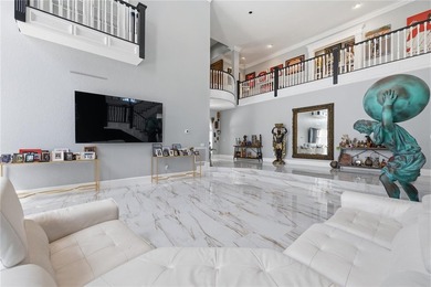 This 7-bedroom, 10-bathroom mini mansion is located in an - photo 9