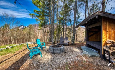 Set on a private lot with sweeping Whiteface Mountain views and - photo 8