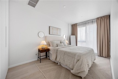 Residence 21A at Bayview Courtyard offers elevated city living - photo 25