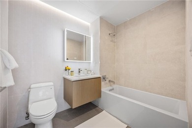 Residence 21A at Bayview Courtyard offers elevated city living - photo 27